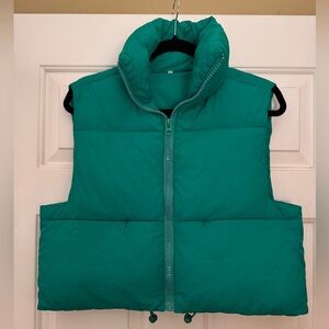 Cropped green puffer vest